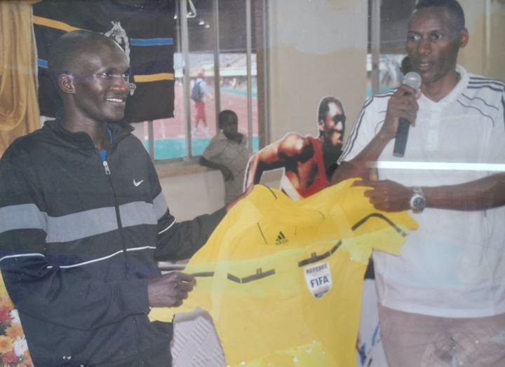 Presenting a FIFA referee's jersey