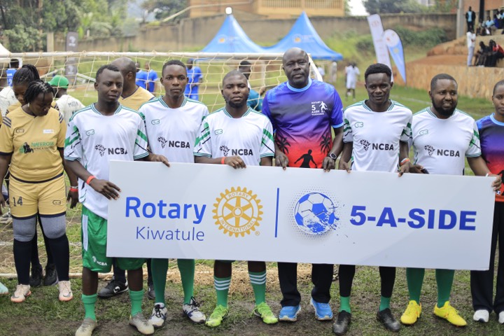 NCBA players behind the 5-A-Side banner